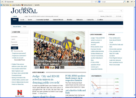 New appearance of www.fcjournal.net with the E-editions tab to the right of the screen.