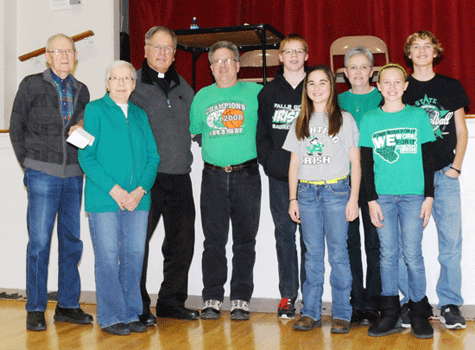 Participating in Friday’s kickoff event to raise funds for a new activity center at Falls City Sacred Heart School, from left: Dick and NiNi Frederick, FCSH Supt. Msgr. Robert Roh, the Marc Morehead Family (Marc, William, Teresa and Marcia) and Erison and Easton Vonderschmidt. Photo by Jim Langan. Architectural rendering of proposed new activities center can be be found below. 