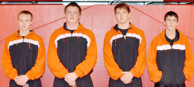 Falls City High medaled four Saturday during the season opener in Wamego, KS, from left to right, Morgen Valentine (2nd, 145 pounds), Jeremy Zimmerman, (1st, HWT), Chase Thompson, (4th, 192) and Deven Nycum (4th, 132). The Tiger wrestlers travel to Crete next Saturday. Photo courtesy of Angie Hunzeker.