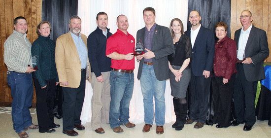 Honored at the annual EDGE banquet, held last Wednesday at the Elks Club, from left: Andy and Nikki Dunn, Paul Deffenbaugh, Jay Bechtold, Gavin Mitchell, Seth Post, Carla Rhodd, Eric Kresin and Linda and Jerry Duerfeldt. 