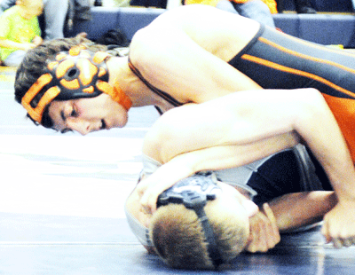 Falls City High’s Deven Nycum, a 126-pound freshman, won by decision, 12-7, over Corbin Halls of Sabetha (KS) last Thursday in Sabetha. Photo by Jim Langan.