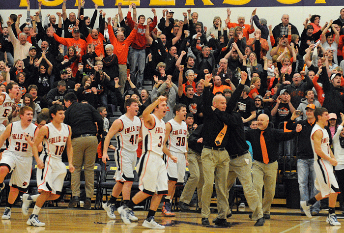 For any fan of the underdog and especially those who also pledge their allegiance to orange and black cats, the Nebraska City High School gymnasium was the place to be Monday night, as the Falls City Tigers upset second-ranked Lincoln Christian 37-36 to earn, for the second time in 51 years, a trip to the State Basketball Tournament. With 7.2 seconds left and FC down a point, senior Mitchell Harling drove to the bucket where he came face-to-chest with Jared Bubak, a 6-5, 225-pound sophomore man-child you really have to see to believe. Harling, who eclipsed the 1,000-point career mark earlier in the game, elevated up and evaded Bubak with the uncommon athleticism that accounted for the majority of those 1,000 points in four years. But it was indomitable will that slipped the ball over the iron and through the nylon. Then that same “will” prevented Christian from scoring a game-winner at the buzzer. And produced a 25-16 rebounding edge over a 6-4, 6-5, 6-4 frontcourt. And held perhaps the top player in Class C1 — 6-4 senior Logan Power — to a grand total of seven shot attempts and 11 points. The eighth-ranked 24-2 Tigers “willed” themselves to victory over a team picked by many to win it all this season; a team rated No. 1 just three weeks ago. FCHS Coach Don Hogue, the winningest coach in school history, said as much, in his own words. “I thought our team was tougher,” he said. Photos by Jason Schock.