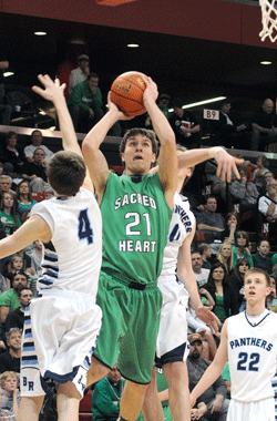 FCHS senior Matt Goltz and the Irish for a second straight year lost in the Class D2 semis, but finished the year with a victory in the consolation game. Goltz recorded his seventh double-double of the season – 15 points, 12 rebounds – against Bancroft-Rosalie and averaged (12 ppg, 10 rpg) a double-double in the Irish’s three games in Lincoln. Photo by Jim Langan.